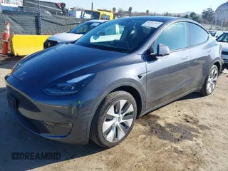 2023 Tesla Model Y Long Range with VIN 7SAYGAEE5PF964083, listed as a IAAI auction lot 41365919 with 26,008 mi miles and . Bid and sale history available at carsss.com. Image 20.