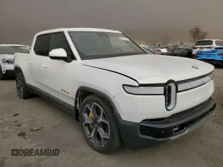 2022 Rivian R1T Adventure z VIN 7FCTGAAA9NN014280, wystawiony jako Copart lot #87908175 z przebiegiem 28 601 mil mil oraz Szkody całkowita. Historia ofert i sprzedaży dostępna na DreamBid. Obrazek 4.