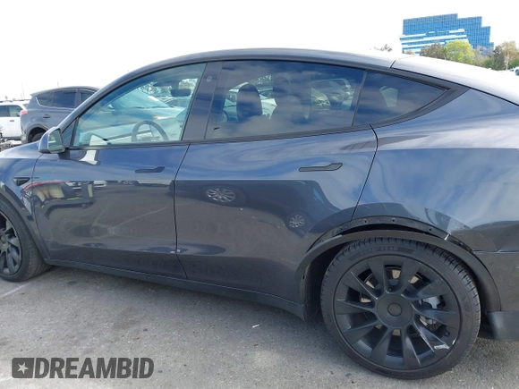 2021 Tesla Model Y Long Range with VIN 5YJYGDEE6MF209034, listed as a IAAI auction lot 41896238 with 53,401 mi miles. Bid and sale history available at carsss.com. Image 15.