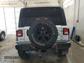 2023 Jeep Wrangler z VIN 1C4JJXN64PW630179, wystawiony jako Copart lot #44457744 z przebiegiem 27 905 mil mil oraz Czysty tytuł • Clean title. Historia ofert i sprzedaży dostępna na DreamBid. Obrazek 6.