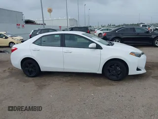 2019 Toyota Corolla L with VIN 5YFBURHE1KP930676, listed as a IAAI auction lot 41940047 with 82,885 mi miles. Bid and sale history available at carsss.com. Image 13.