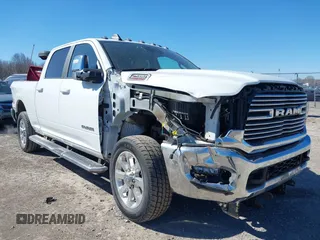 2023 Ram 2500 Laramie with VIN 3C6UR5FJ9PG530727, listed as a IAAI auction lot 41803946 with 19,992 mi miles and . Bid and sale history available at DreamBid. Image 6.
