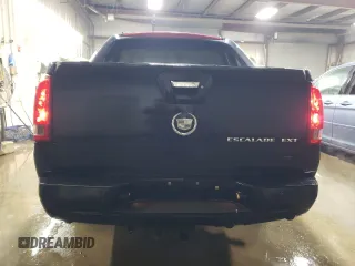 2003 Cadillac Escalade EXT z VIN 3GYEK63N33G118001, wystawiony jako Copart lot #86897574 z przebiegiem 223 953 mil mil oraz Szkoda całkowita • Salvage title. Historia ofert i sprzedaży dostępna na DreamBid. Obrazek 6.