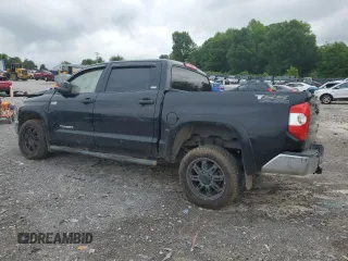 2014 Toyota Tundra SR5 with VIN 5TFEY5F14EX165589, listed as a Copart auction lot 57311785 with 165,343 mi miles and Salvage title. Bid and sale history available at DreamBid. Image 2.