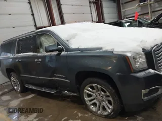 2019 GMC Yukon XL SLT with VIN 1GKS2GKC5KR137005, listed as a IAAI auction lot 41435370 with 125,453 mi miles and . Bid and sale history available at carsss.com. Image 12.