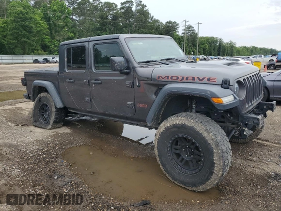 2020 Jeep Gladiator Mojave с VIN 1C6JJTEG4LL206635, выставлен на аукционе Copart как лот 57681805 с пробегом 112 161 миль миль и Списание • Salvage title. История ставок и продаж доступна на DreamBid. Изображение 4.