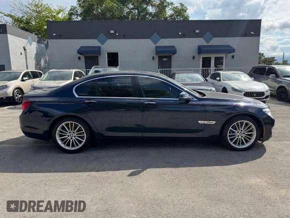 2015 BMW 7 Series 750i xDrive with VIN WBAYB6C5XFD965910, listed as a Copart auction lot 55407895 with 173,486 mi miles and Salvage Title. Bid and sale history available at carsss.com. Image 13.
