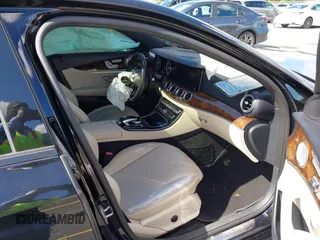 2017 Mercedes-Benz E 300 Luxury with VIN WDDZF4JB8HA054123, listed as a IAAI auction lot 39716802 with 112,008 mi miles and . Bid and sale history available at carsss.com. Image 5.
