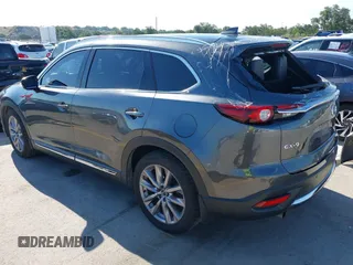 2020 Mazda CX-9 Grand Touring with VIN JM3TCADY1L0417651, listed as a IAAI auction lot 42334867 with 105,236 mi miles and . Bid and sale history available at DreamBid. Image 3.