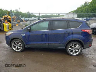 2016 Ford Escape Titanium with VIN 1FMCU9J95GUB65432, listed as a IAAI auction lot 42503176 with 96,362 mi miles and . Bid and sale history available at DreamBid. Image 13.