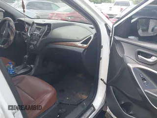 2013 Hyundai Santa Fe Sport z VIN 5XYZU3LA4DG087841, wystawiony jako IAAI lot #42238197 z przebiegiem 160 888 mil mil oraz . Historia ofert i sprzedaży dostępna na DreamBid. Obrazek 5.