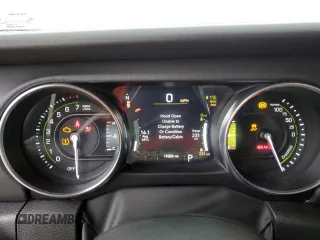 2023 Jeep Wrangler Rubicon z VIN 1C4JJXR63PW566503, wystawiony jako Copart lot #49884605 z przebiegiem 19 304 mil mil oraz Szkoda całkowita • Salvage title. Historia ofert i sprzedaży dostępna na DreamBid. Obrazek 9.