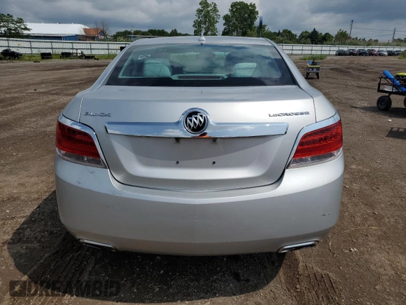 2013 Buick LaCrosse z VIN 1G4GA5E35DF128714, wystawiony jako Copart lot #61446425 z przebiegiem 128 419 mil mil oraz Szkoda całkowita • Salvage title. Historia ofert i sprzedaży dostępna na DreamBid. Obrazek 6.