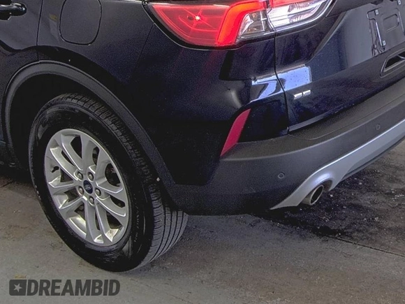 2021 Ford Escape SE Hybrid z VIN 1FMCU9BZ3MUA52539, wystawiony jako IAAI lot #42437654 z przebiegiem 59 148 mil mil oraz . Historia ofert i sprzedaży dostępna na DreamBid. Obrazek 16.