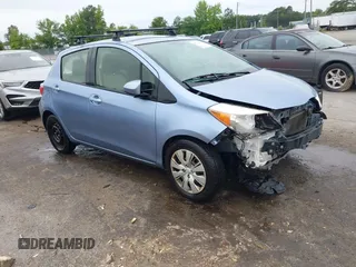 2012 Toyota Yaris L z VIN JTDKTUD32CD529121, wystawiony jako IAAI lot #42347077 z przebiegiem 226 283 mil mil oraz . Historia ofert i sprzedaży dostępna na DreamBid. Obrazek 1.
