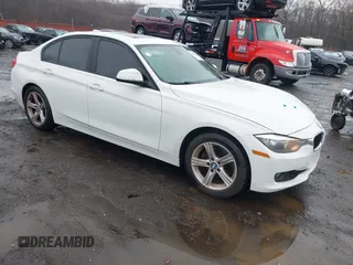 2013 BMW 3 Series 328i xDrive with VIN WBA3B3G50DNR81124, listed as a IAAI auction lot 41087933 with 133,660 mi miles. Bid and sale history available at carsss.com. Image 1.