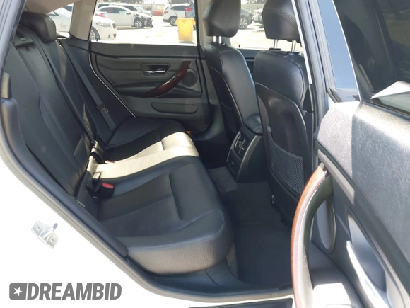 2015 BMW 4 Series 428i with VIN WBA4A9C50FGL85857, listed as a IAAI auction lot 42542619 with 136,411 mi miles and . Bid and sale history available at DreamBid. Image 8.