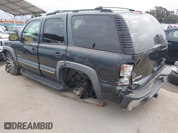 2003 Chevrolet Tahoe LS with VIN 1GNEC13T73R297770, listed as a IAAI auction lot 42071895 with 215,848 mi miles. Bid and sale history available at carsss.com. Image 3.