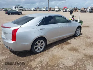2014 Cadillac ATS Standard RWD with VIN 1G6AA5RA1E0104839, listed as a IAAI auction lot 42383432 with 142,701 mi miles and . Bid and sale history available at DreamBid. Image 4.