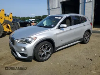 2017 BMW X1 xDrive28i with VIN WBXHT3C34H5F85719, listed as a Copart auction lot 62176645 with 62,694 mi miles and Salvage title. Bid and sale history available at DreamBid. Image 1.
