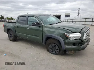 2021 Toyota Tacoma SR z VIN 3TYCZ5AN3MT046066, wystawiony jako Copart lot #54785665 z przebiegiem 57 897 mil mil oraz Szkoda całkowita • Salvage title. Historia ofert i sprzedaży dostępna na DreamBid. Obrazek 4.
