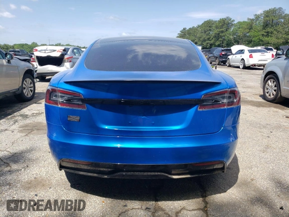 2021 Tesla Model S Plaid with VIN 5YJSA1E64MF438794, listed as a Copart auction lot 56903365 with 63,671 mi miles and Salvage title. Bid and sale history available at DreamBid. Image 6.