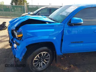 2021 Toyota Tacoma SR z VIN 3TYCZ5AN7MT008274, wystawiony jako IAAI lot #42091508 z przebiegiem 59 371 mil mil oraz . Historia ofert i sprzedaży dostępna na DreamBid. Obrazek 18.