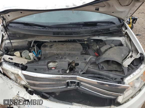 2013 Honda Odyssey EX-L with VIN 5FNRL5H62DB048370, listed as a Copart auction lot 63013465 with 129,552 mi miles and Salvage title. Bid and sale history available at DreamBid. Image 12.