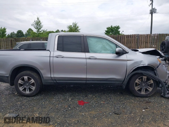 2017 Honda Ridgeline RTL with VIN 5FPYK3F52HB019266, listed as a IAAI auction lot 42638081 with 117,004 mi miles and . Bid and sale history available at DreamBid. Image 13.