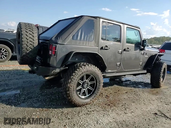 2018 Jeep Wrangler JK Unlimited Sport S with VIN 1C4BJWDG0JL842059, listed as a Copart auction lot 74382094 with 63,373 mi miles and Salvage Title. Bid and sale history available at carsss.com. Image 14.
