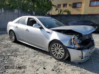 2011 Cadillac CTS Premium z VIN 1G6DS5ED2B0104323, wystawiony jako Copart lot #56596885 z przebiegiem Nie podano mil oraz Szkody całkowita. Historia ofert i sprzedaży dostępna na DreamBid. Obrazek 4.