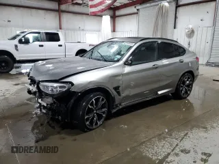 2021 BMW X4 M with VIN 5YMUJ0C05M9E04935, listed as a Copart auction lot 42149535 with 0 mi miles and Salvage Title. Bid and sale history available at carsss.com. Image 1.