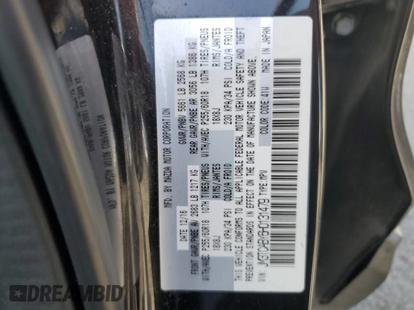 2017 Mazda CX-9 Sport z VIN JM3TCABY6H0131479, wystawiony jako Copart lot #57178805 z przebiegiem 98 698 mil mil oraz Szkoda całkowita • Salvage title. Historia ofert i sprzedaży dostępna na DreamBid. Obrazek 13.