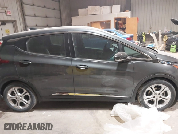 2021 Chevrolet Bolt EV LT z VIN 1G1FY6S05M4111315, wystawiony jako IAAI lot #41511422 z przebiegiem 14 433 mil mil oraz . Historia ofert i sprzedaży dostępna na DreamBid. Obrazek 12.