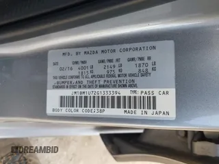 2016 Mazda 3 i Sport with VIN JM1BM1U72G1333394, listed as a IAAI auction lot 42066192 with 216,953 mi miles and . Bid and sale history available at carsss.com. Image 9.