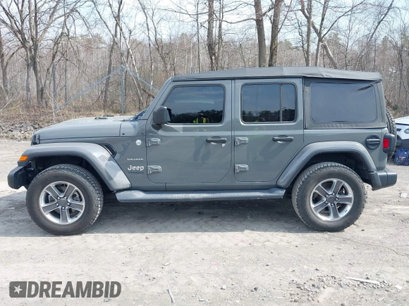 2018 Jeep Wrangler Unlimited Sahara z VIN 1C4HJXEN8JW329816, wystawiony jako IAAI lot #42055851 z przebiegiem 70 298 mil mil oraz . Historia ofert i sprzedaży dostępna na DreamBid. Obrazek 14.