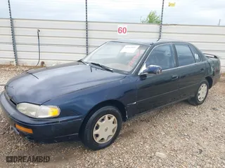 1996 Toyota Camry DX with VIN 4T1BG12K6TU754392, listed as a IAAI auction lot 42013697 with 172,410 mi miles. Bid and sale history available at carsss.com. Image 2.