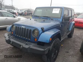 2010 Jeep Wrangler Unlimited Sahara with VIN 1J4BA5H17AL166915, listed as a IAAI auction lot 41561508 with 252,337 mi miles. Bid and sale history available at carsss.com. Image 17.