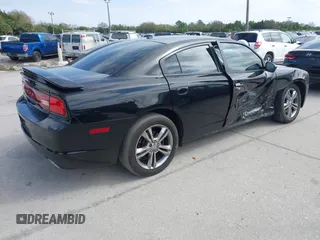 2013 Dodge Charger SXT z VIN 2C3CDXJG2DH528683, wystawiony jako IAAI lot #41644348 z przebiegiem 124 157 mil mil oraz . Historia ofert i sprzedaży dostępna na DreamBid. Obrazek 4.