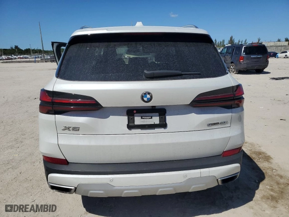 2024 BMW X5 sDrive40i with VIN 5UX13EU00R9S43348, listed as a Copart auction lot 49572065 with 0 mi miles and Salvage Title. Bid and sale history available at carsss.com. Image 6.