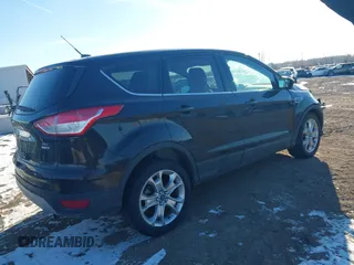 2013 Ford Escape SEL with VIN 1FMCU9HX5DUB53507, listed as a IAAI auction lot 41430216 with 106,643 mi miles. Bid and sale history available at carsss.com. Image 4.