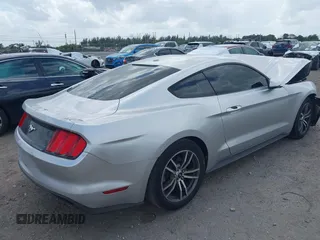2016 Ford Mustang EcoBoost z VIN 1FA6P8TH5G5305096, wystawiony jako IAAI lot #41908211 z przebiegiem 106 585 mil mil oraz . Historia ofert i sprzedaży dostępna na DreamBid. Obrazek 4.
