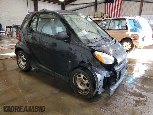 2012 Smart fortwo Pure z VIN WMEEJ3BA3CK570191, wystawiony jako Copart lot #43576165 z przebiegiem 80 511 mil mil oraz Szkody całkowita. Historia ofert i sprzedaży dostępna na DreamBid. Obrazek 4.