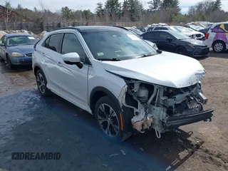 2022 Mitsubishi Eclipse Cross SE z VIN JA4ATWAAXNZ017617, wystawiony jako IAAI lot #41755511 z przebiegiem 59 114 mil mil oraz . Historia ofert i sprzedaży dostępna na DreamBid. Obrazek 1.