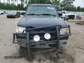 2001 Ford Explorer Sport Trac with VIN 1FMZU67E11UB01604, listed as a Copart auction lot 57581825 with 211,905 mi miles and Salvage title. Bid and sale history available at DreamBid. Image 5.