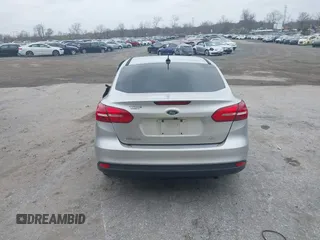 2015 Ford Focus SE with VIN 1FADP3F29FL258781, listed as a IAAI auction lot 41963223 with 121,286 mi miles and . Bid and sale history available at DreamBid. Image 16.