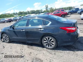 2017 Nissan Altima SV with VIN 1N4AL3AP0HC144575, listed as a IAAI auction lot 40129580 with 184,765 mi miles and . Bid and sale history available at DreamBid. Image 14.