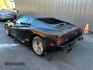 1988 Pontiac Fiero z VIN 1G2PE119XJP213392, wystawiony jako Copart lot #55215415 z przebiegiem 71 246 mil mil oraz Tytuł czysty. Historia ofert i sprzedaży dostępna na DreamBid. Obrazek 3.