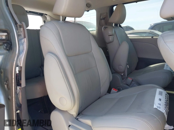 2015 Toyota Sienna XLE with VIN 5TDYK3DC9FS532310, listed as a IAAI auction lot 41990553 with 75,133 mi miles and . Bid and sale history available at DreamBid. Image 8.