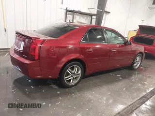 2006 Cadillac CTS with VIN 1G6DM57T560167128, listed as a IAAI auction lot 41911884 with 129,678 mi miles. Bid and sale history available at carsss.com. Image 4.
